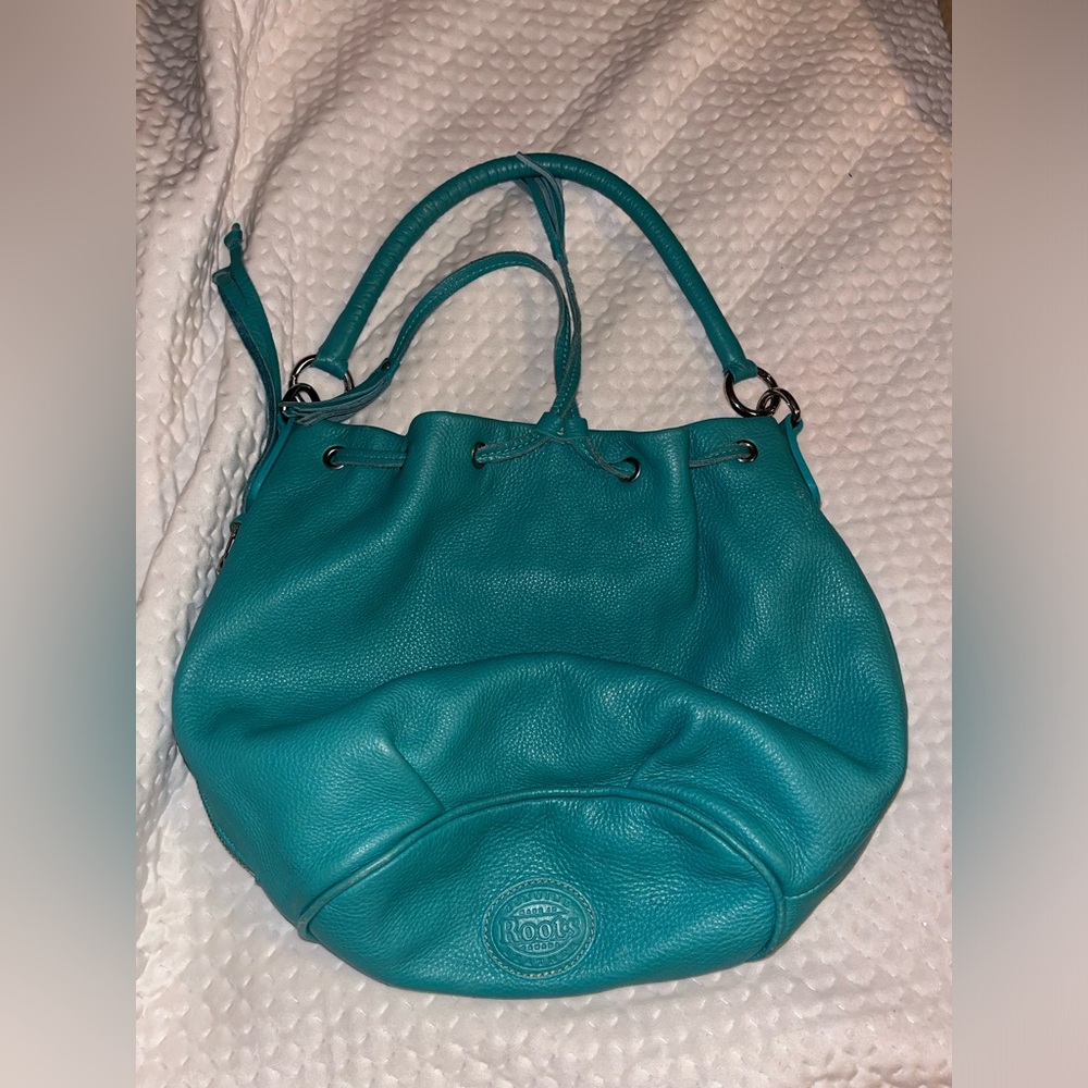 Roots Turquoise leather bucket bag